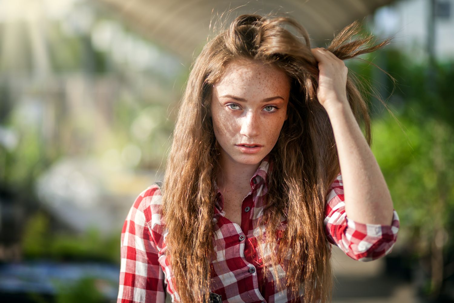 A woman with long red hair
