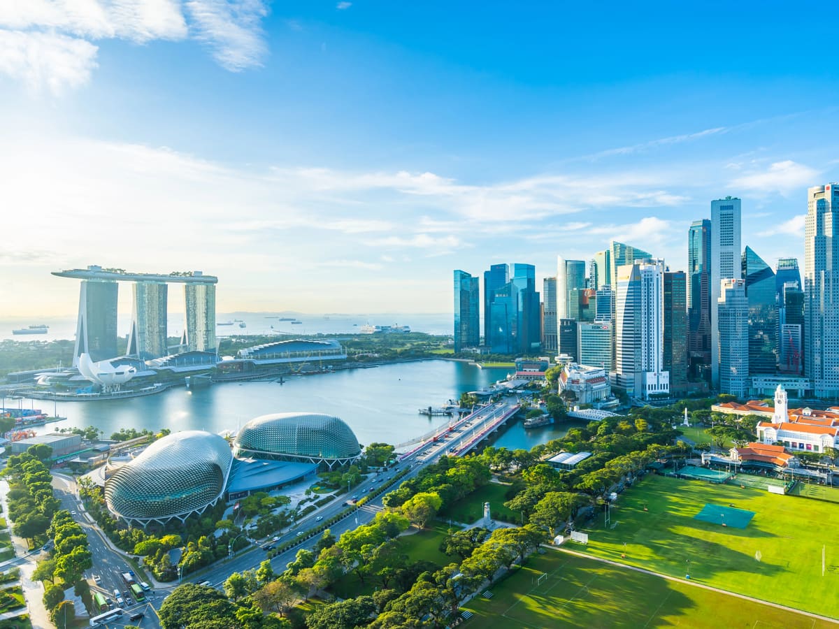 The Singapore skyline across Marina Bay, with Marina Bay Sands and the Esplanade theatres